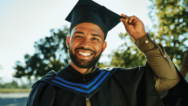 Man graduating with cap and gown